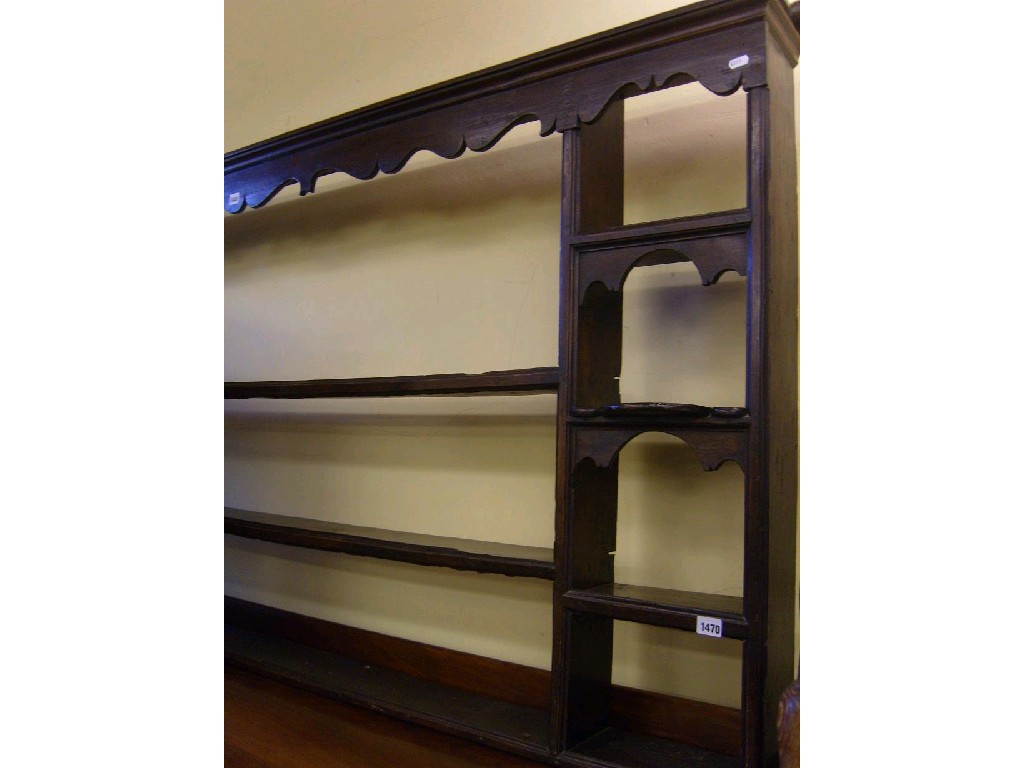 Appraisal: A Georgian oak delft rack with stepped shelves beneath a