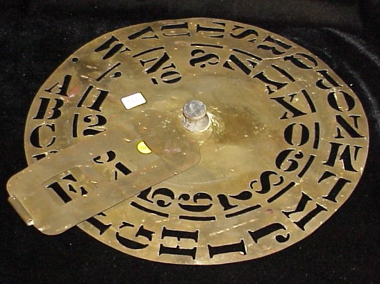 Appraisal: Sign makers letter guide stencil pierced brass disk with rotating