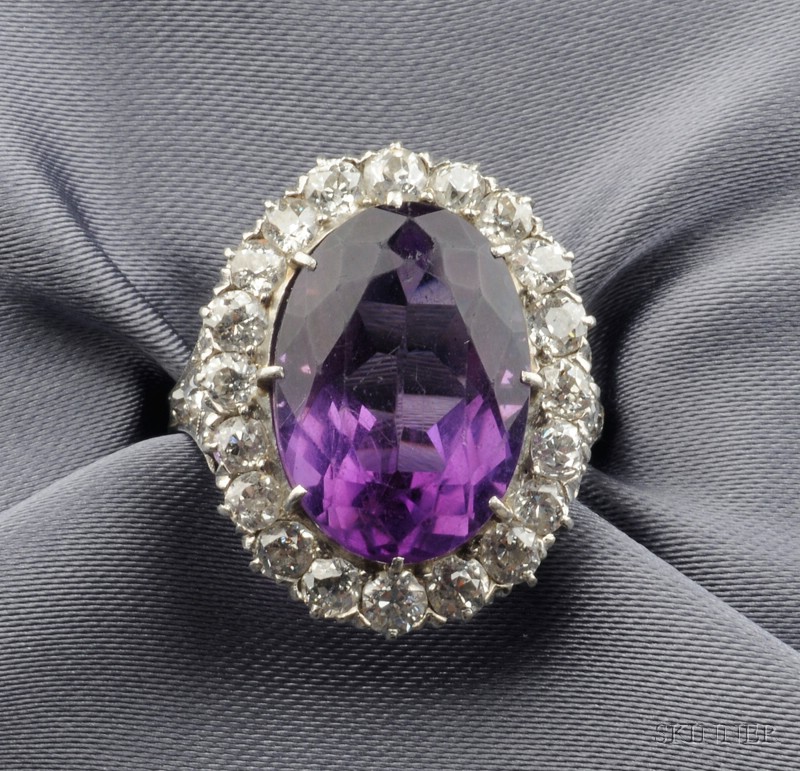 Appraisal: Platinum Amethyst and Diamond Ring prong-set with an oval-shape amethyst