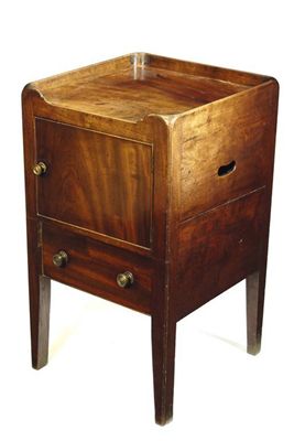 Appraisal: A George III mahogany 'tray top' commode the sides with