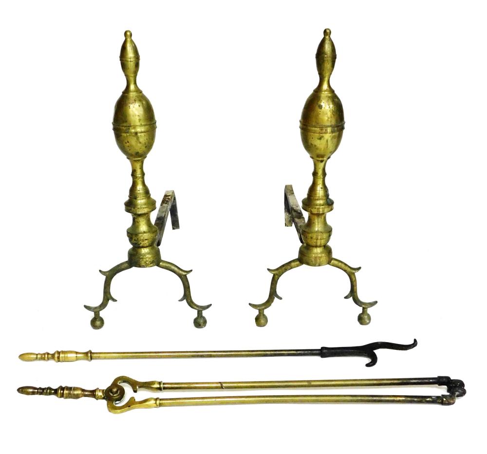 Appraisal: Four brass fireplace accessories including a pair of double lemon