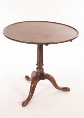 Appraisal: A George III mahogany tripod table on turned fluted columns