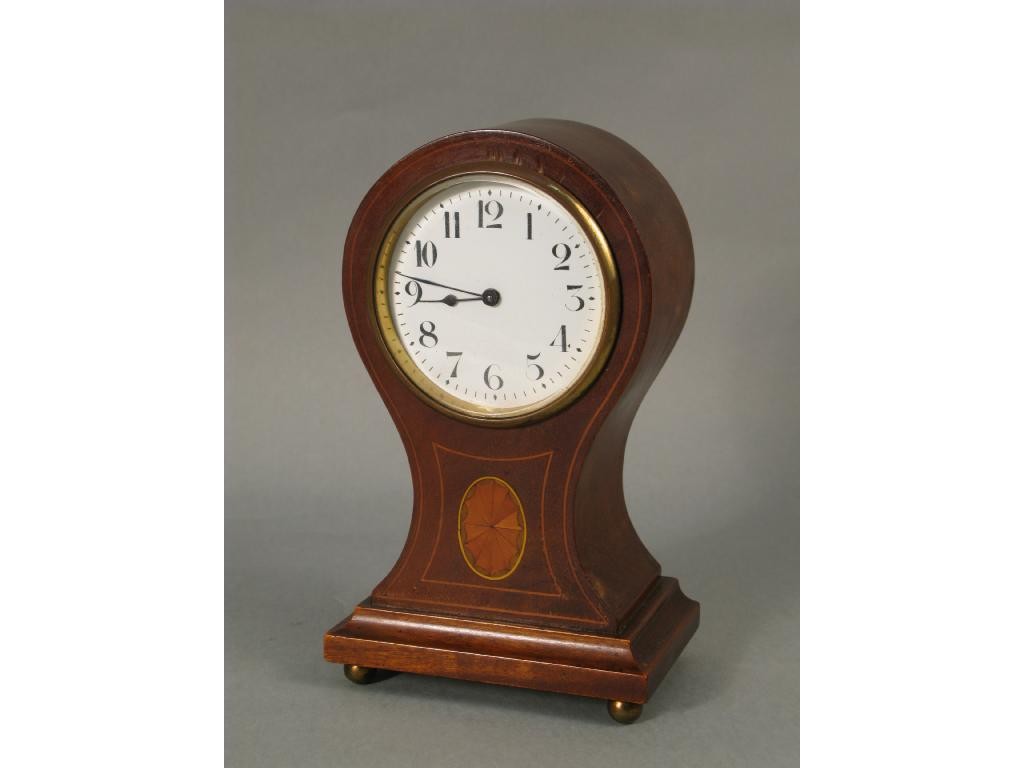 Appraisal: An Edwardian inlaid mahogany mantel clock balloon shape with enamelled