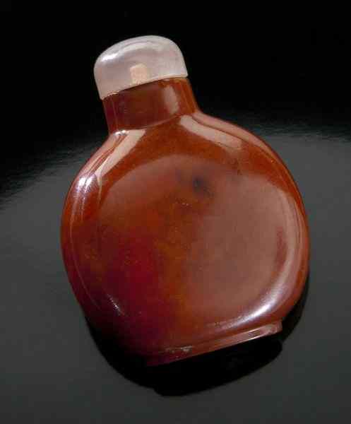 Appraisal: Chinese Qing carved red amber snuff bottle ''H Circa -