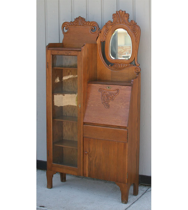 Appraisal: Secretary bookcase slant front mirror with floral trim H x