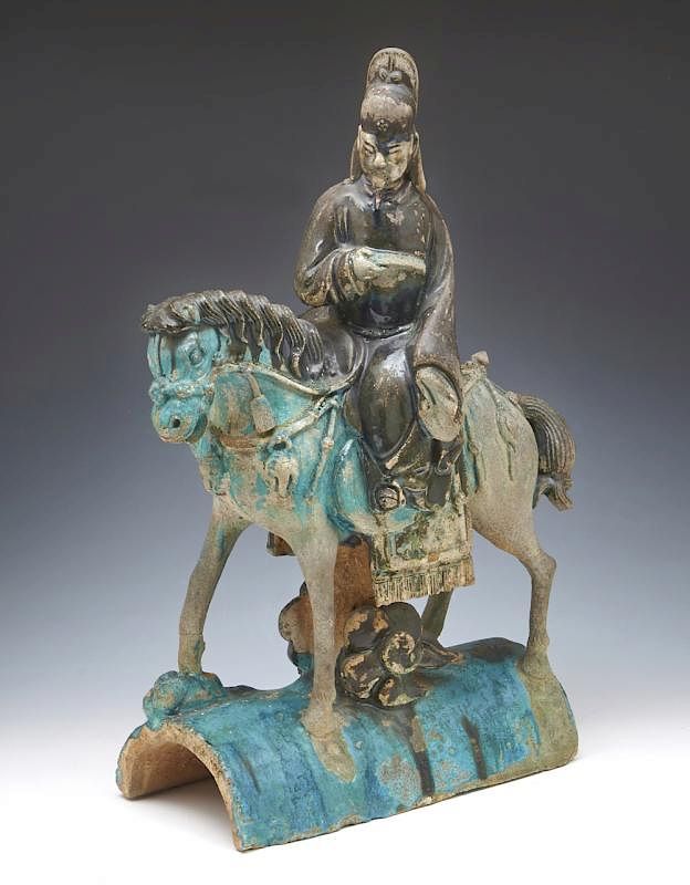 Appraisal: Chinese Roof Tile Immortal on Horseback tall Chinese Sancai Glazed