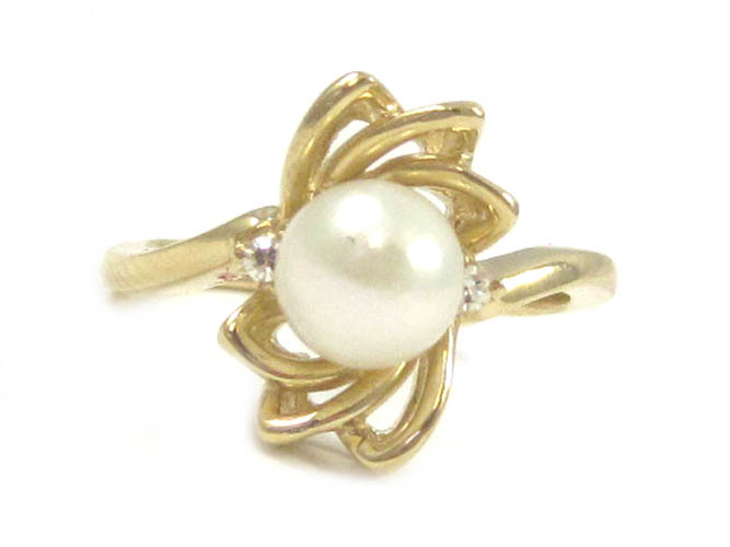 Appraisal: PEARL DIAMOND AND FOURTEEN KARAT GOLD RING with two round-cut