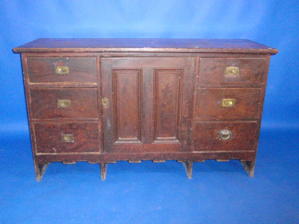 Appraisal: A Victorian pine dresser base with an arrangement of three