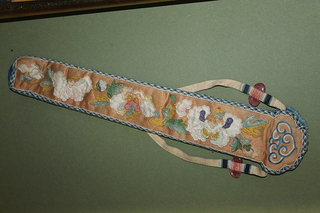 Appraisal: A CHINESE EMBROIDERED HOLDER a square panel and an embroidered