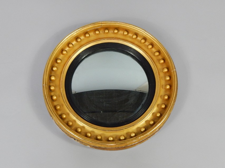 Appraisal: A thC gilt wood circular convex wall mirror cm diameter