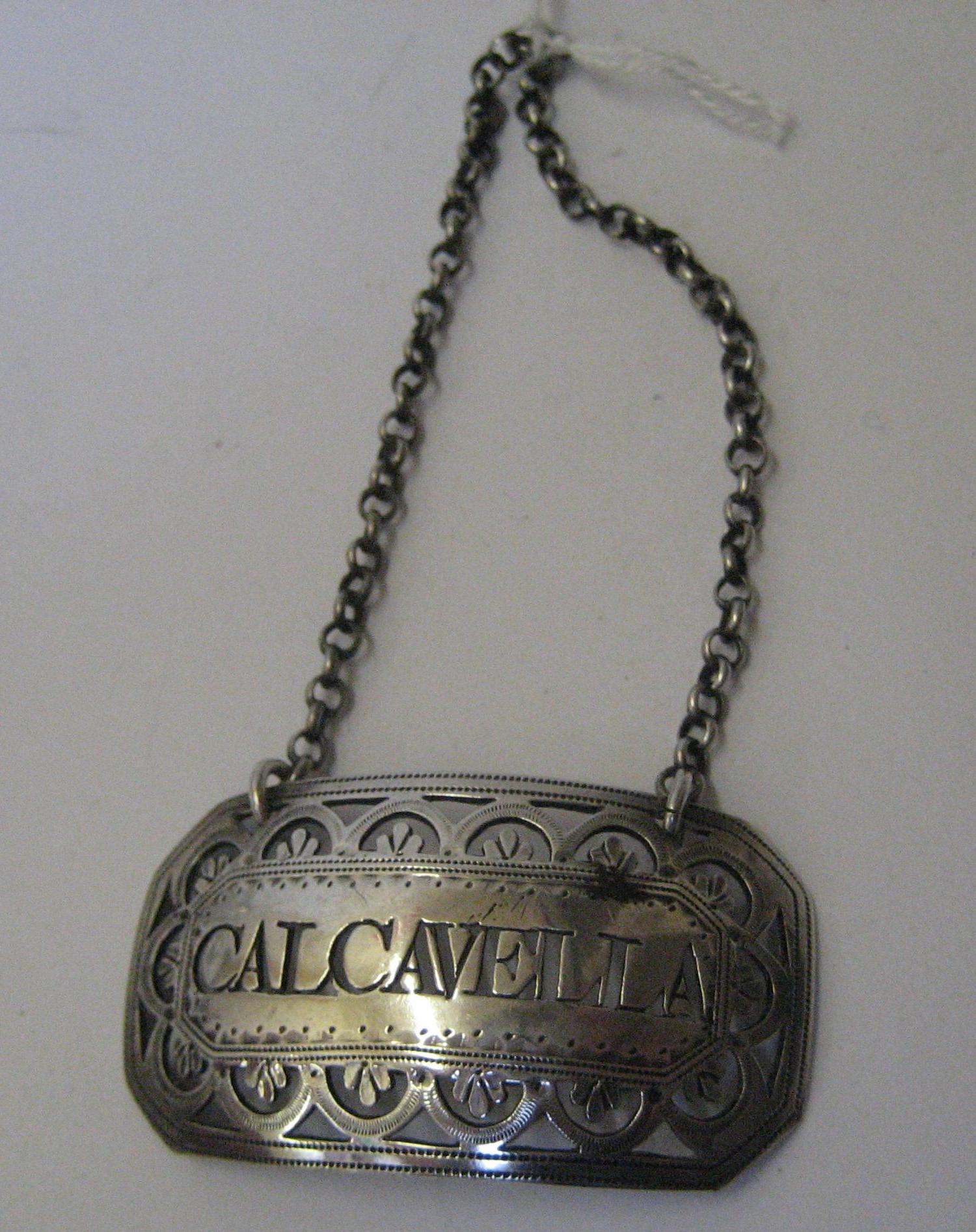 Appraisal: A LATE GEORGE III SILVER BOTTLE TICKET maker Peter and