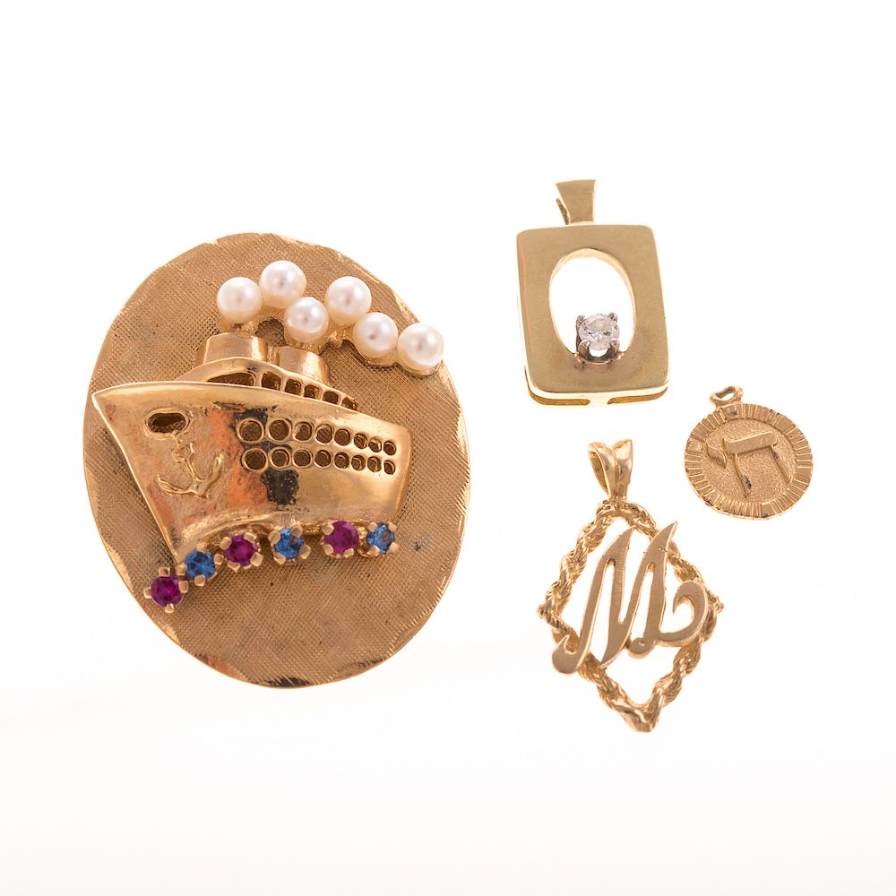 Appraisal: A Selection of Ladies Charms in K K yellow gold