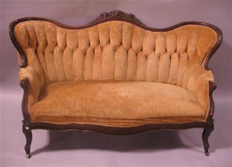 Appraisal: VICTORIAN ROCOCO STYLE MAHOGANY SETTEE h w d in