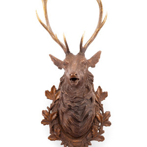 Appraisal: A Black Forest Carved Stag Head th Century Height x