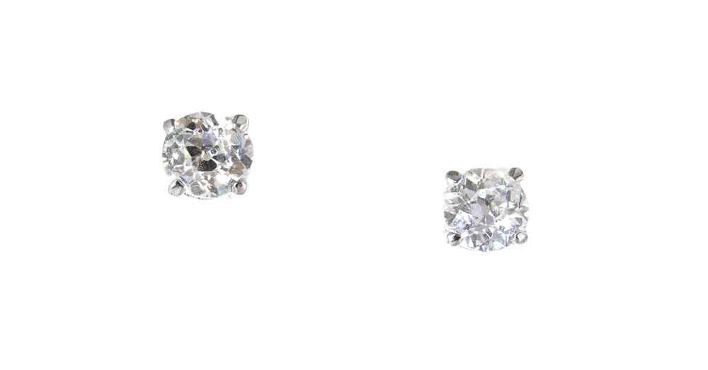 Appraisal: PLATINUM DIAMOND STUD EARRINGS Platinum mountings with K white gold