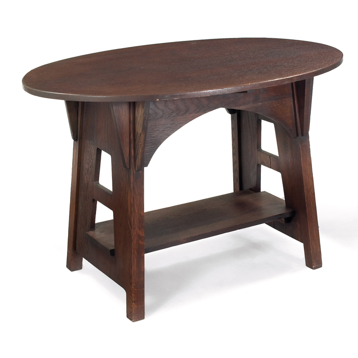 Appraisal: Limbert table oval top over a lower shelf supported by