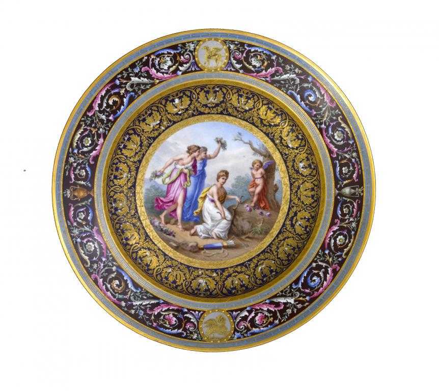 Appraisal: A VIENNA STYLE PLATE painted with Cupid Bound by Nymphs