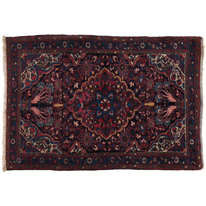 Appraisal: Persian rug c stylized floral design with a central medallion