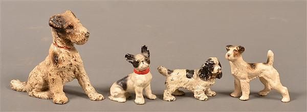 Appraisal: Four Hubley Cast Painted Cast Iron Dog Form Bookend and