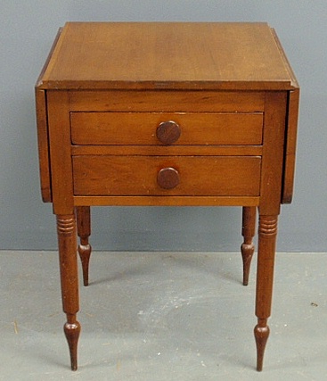 Appraisal: - Sheraton cherry two-drawer end table c with drop leaves