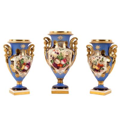 Appraisal: Three English porcelain blue ground oviform vases painted with fruit