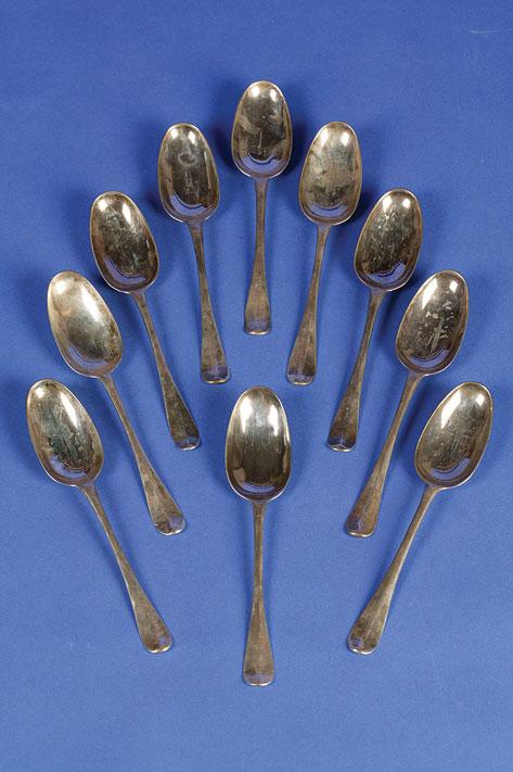 Appraisal: A SET OF ELEVEN GEORGE II DESSERT SPOONS of Hanoverian