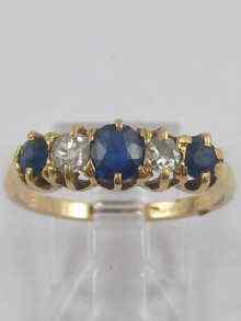 Appraisal: A yellow metal tests ct gold five stone sapphire and