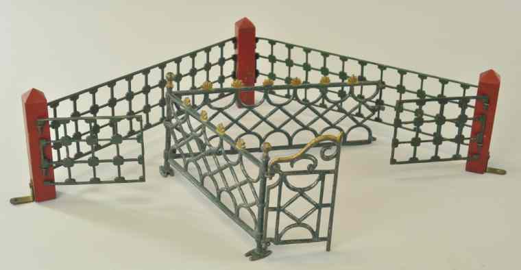 Appraisal: TWO CHRISTMAS FENCE DISPLAYS Cast iron both painted in green