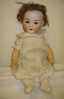 Appraisal: A Heubach Koppelsdorf bisque head doll with blue lashed sleeping