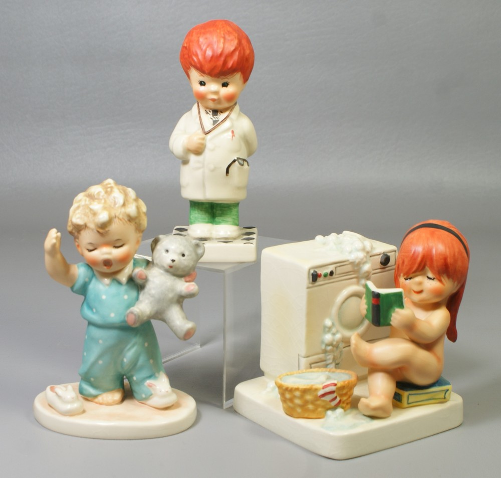 Appraisal: Goebel Figurines Girl doing laundry Byi Doctor Byi Sleepy Boy