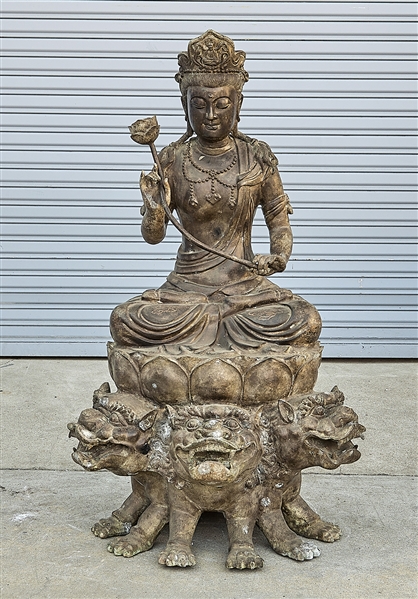 Appraisal: Chinese bronze Guanyin seated atop three lions Xuande mark but