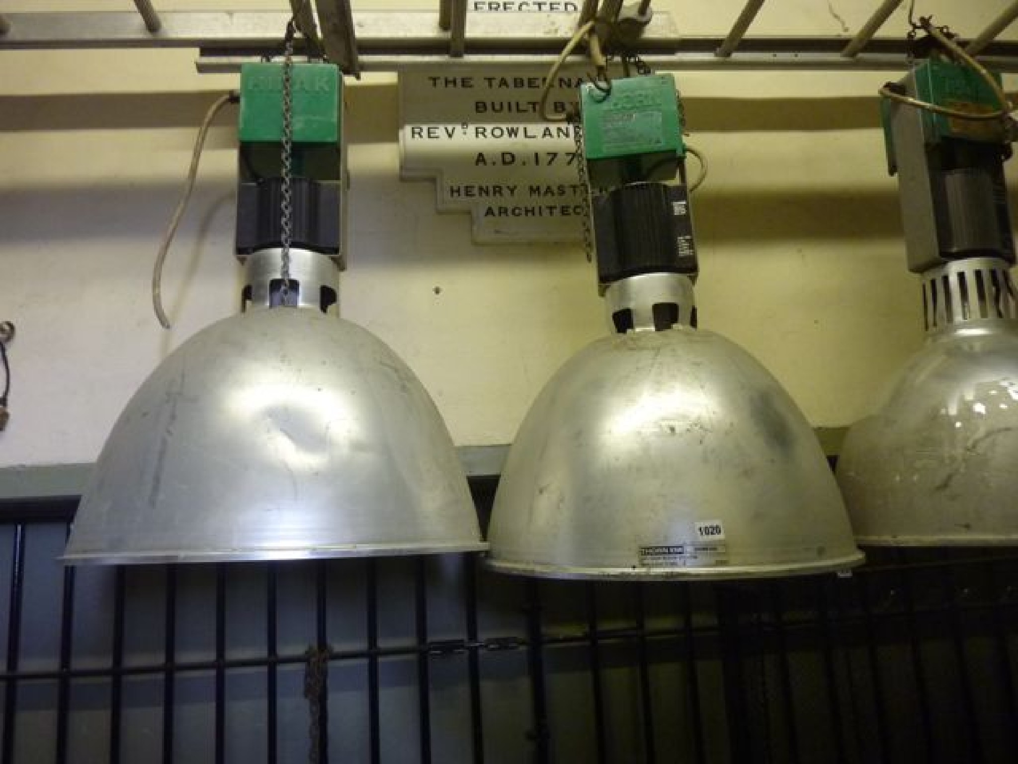 Appraisal: A pair of industrial ceiling lights by Thorn EMI to