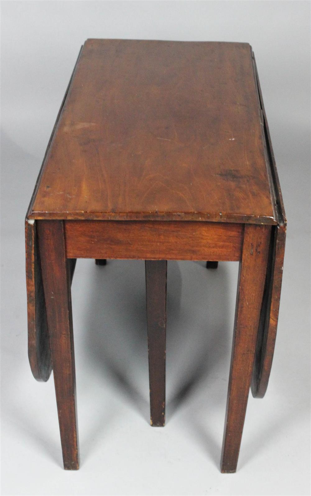 Appraisal: GEORGIAN STYLE MAHOGANY DROP LEAF TABLE having a rectangular top