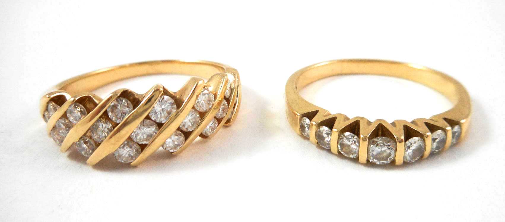 Appraisal: TWO DIAMOND AND FOURTEEN KARAT GOLD RINGS including a size