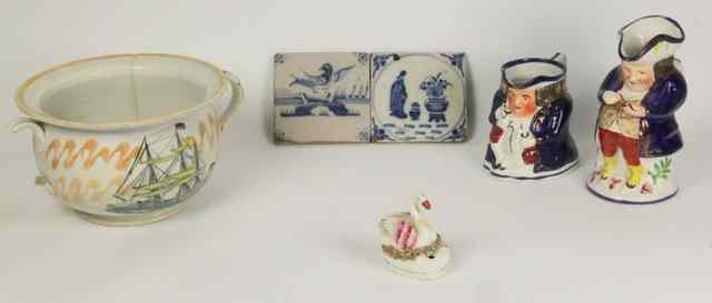 Appraisal: Two Staffordshire Toby jugs a swan pen holder a chamber