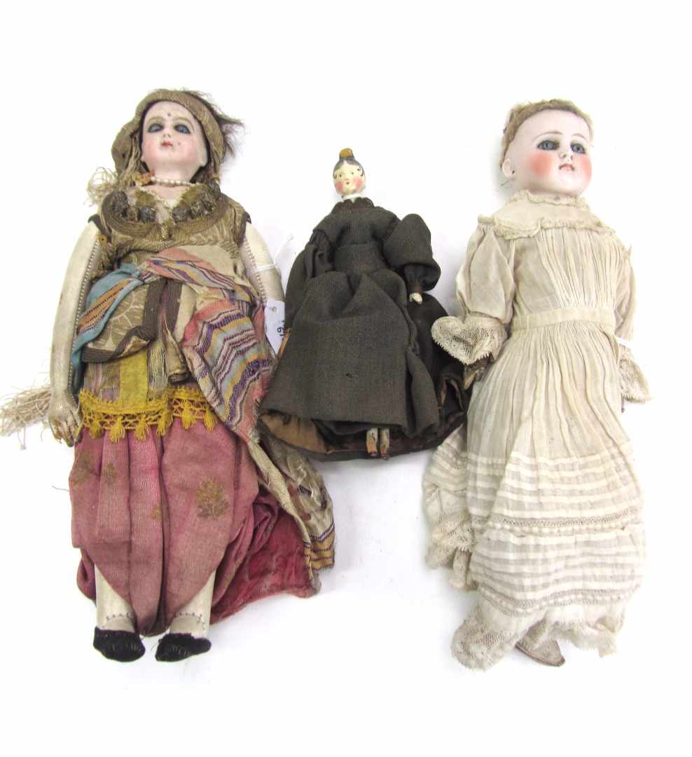 Appraisal: Two bisque porcelain dolls circa probably German unmarked both with