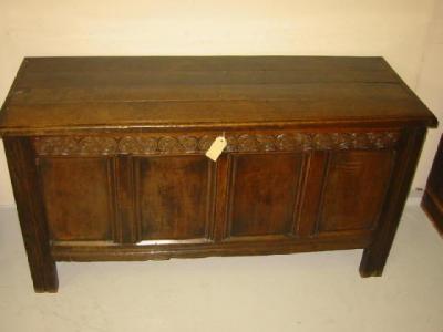 Appraisal: AN OAK PANELLED COFFER early th century the hinged plank