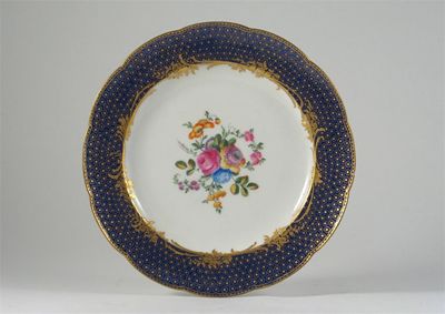 Appraisal: A S vres-style plate the well painted with a colourful