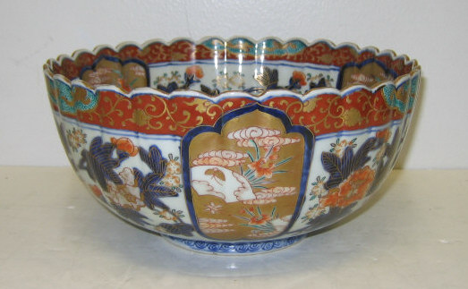 Appraisal: JAPANESE IMARI PORCELAIN BOWL Lobbed with shaped rim decorated blue