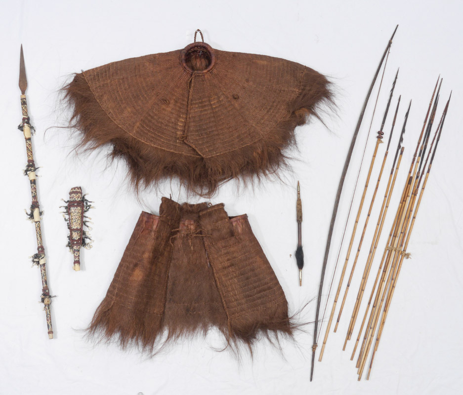 Appraisal: POLYNESIAN COCONUT FIBER RAIN SUIT SPEARS Collection of items to