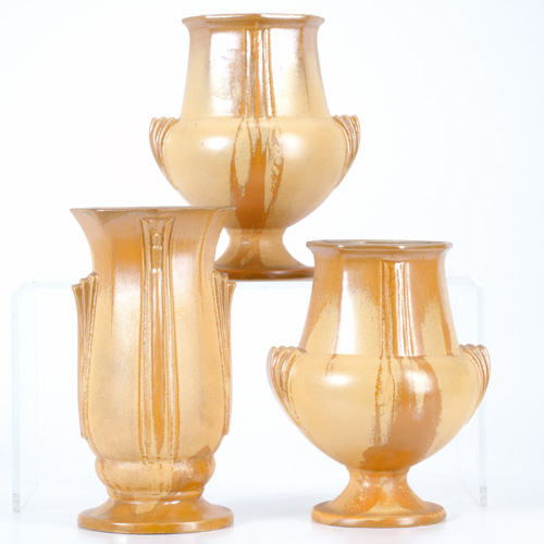 Appraisal: ROSEVILLE Three orange Russco vases Several repairs to the tallest