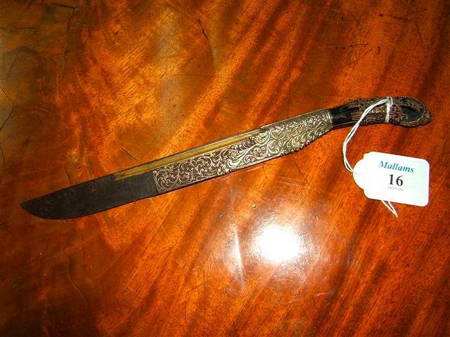 Appraisal: An antique Cingalese silver-mounted piha-kaetta knife long