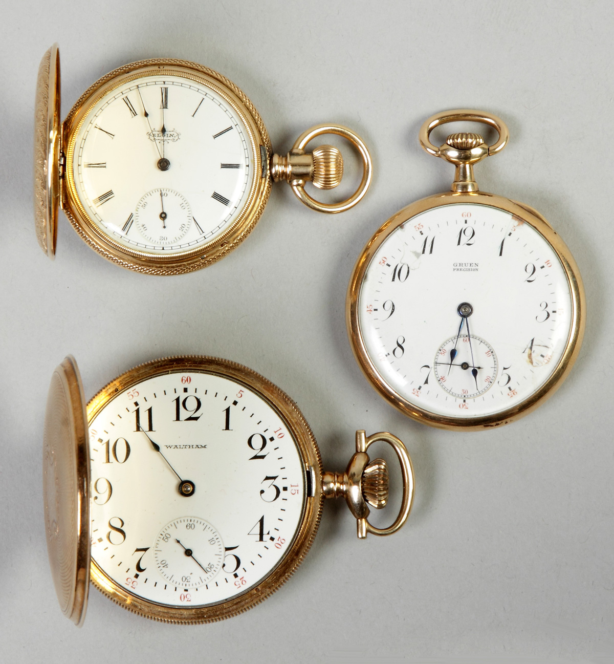 Appraisal: Three K Gold Pocket Watches Elgin engraved case set w