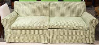 Appraisal: Moderne three seat sofa having a square profile in green