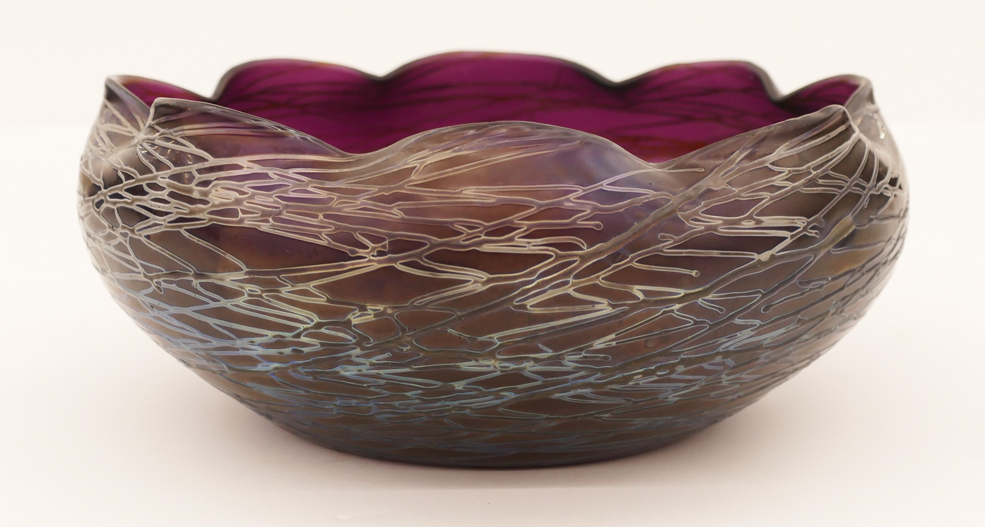 Appraisal: Kralik Purple Iridescent Threaded Glass Bowl ''x '' Bohemian ruffled