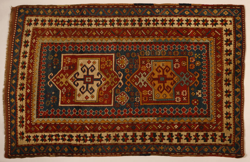 Appraisal: A Caucasian Kazak woolen rug A Caucasian Kazak woolen rugFirst