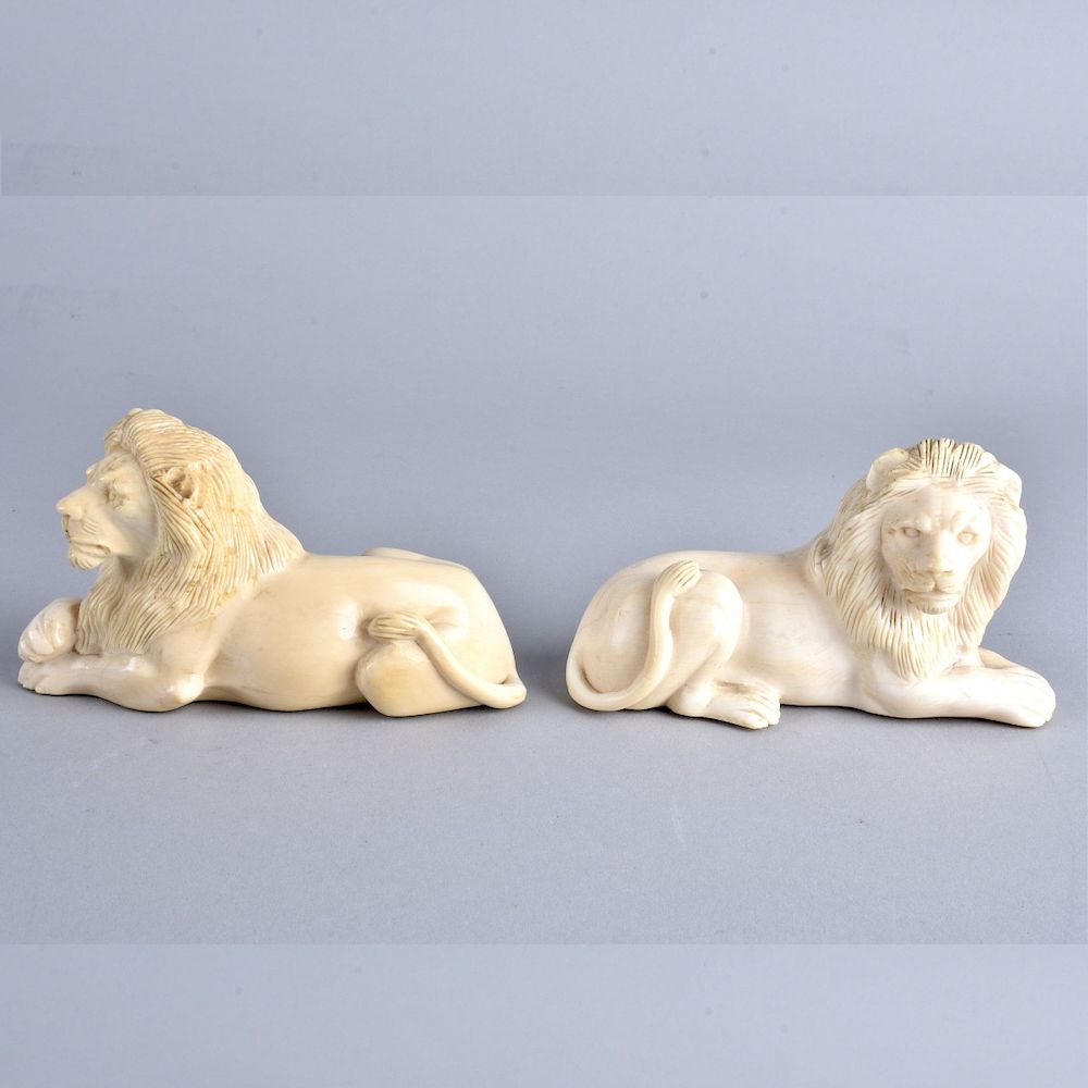 Appraisal: Carved Ivory Lions Pair of European School Carved Ivory Recumbent