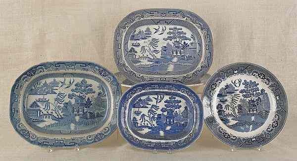 Appraisal: Four Staffordshire blue Willow platters together with a charger