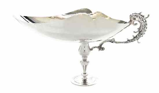 Appraisal: An Italian Silver Footed Center Bowl having a dragon form