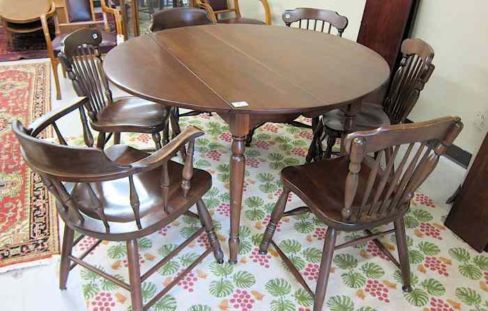 Appraisal: COLONIAL STYLE DROP-LEAF DINING TABLE AND CHAIR SET American th